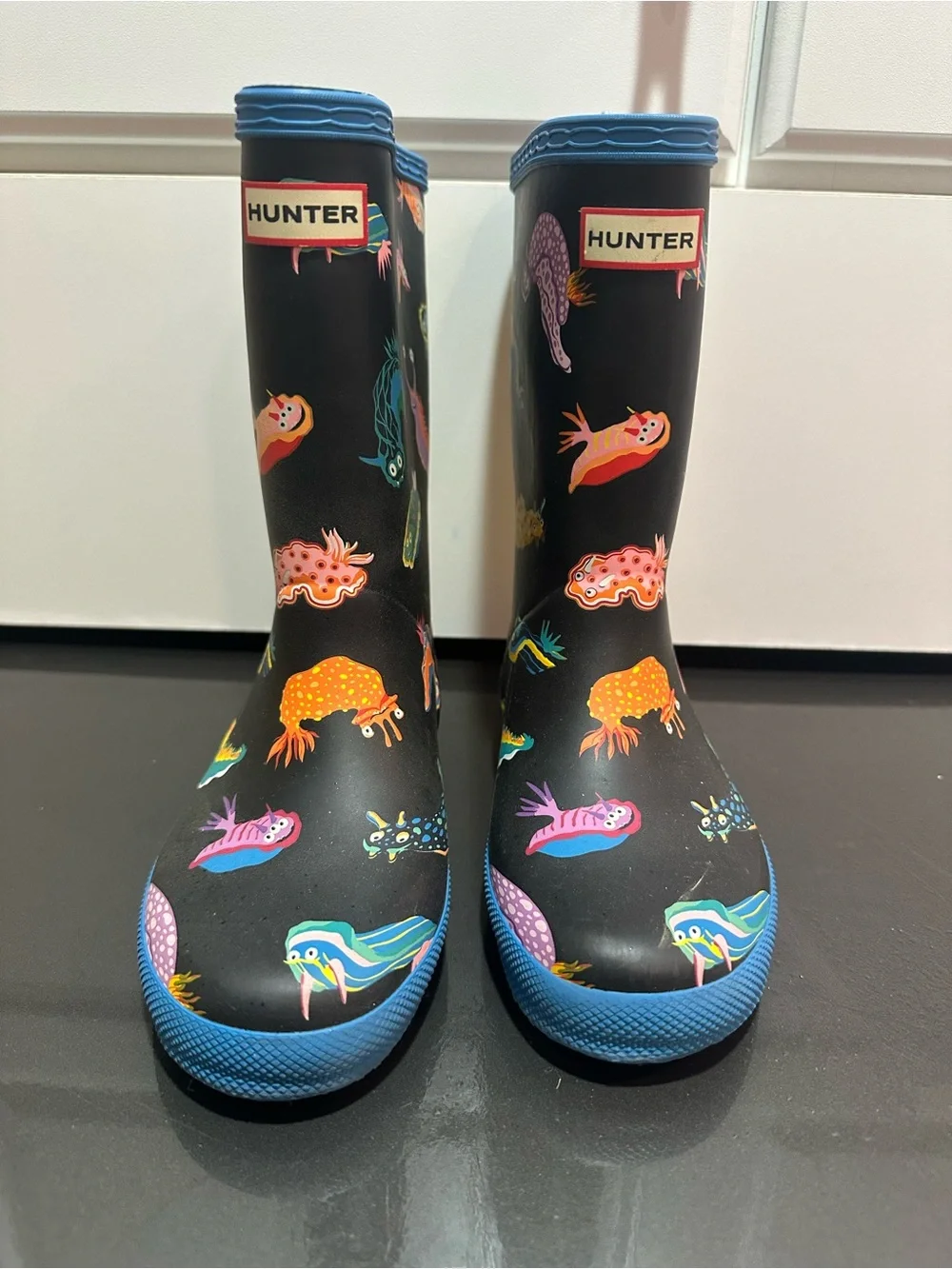 Hunter Kids Black Rain Boots with Colorful Sea Creature Print and Blue Trim